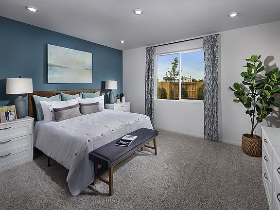 Residence 1 floorplan modeled at a nearby Meritage community.