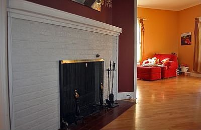 Fireplace.  Note the hardwood floors!