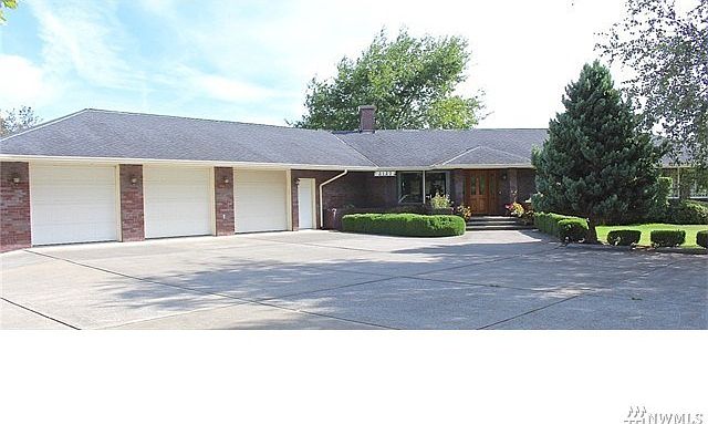 Everything you have been searching for...attractive & immaculate ranch style home on level acreage with 3 car garage, barn, shop and pasture land with easy I-5 access!