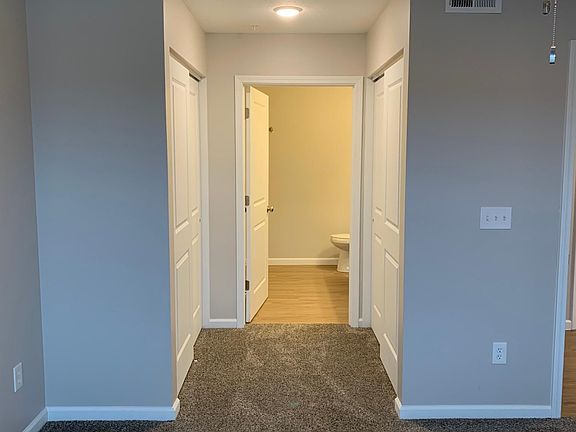 Master bedroom view to the bathroom! The master room has 2 closets with an additional walk-in! The master bathroom has a oversized linen closet with a ton of storage!