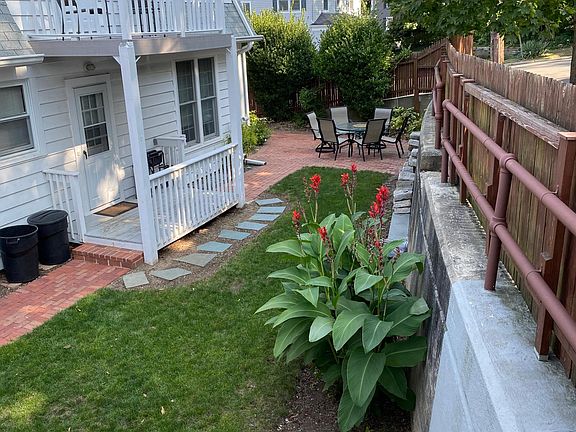 Stairs from ample street parking and 2nd backyard view