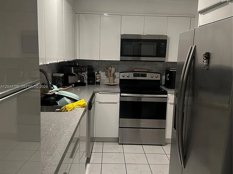 9225 Collins Ave #303 — Photo 9