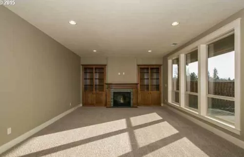 Living area with fireplace - 15984 NW Heckman Ln