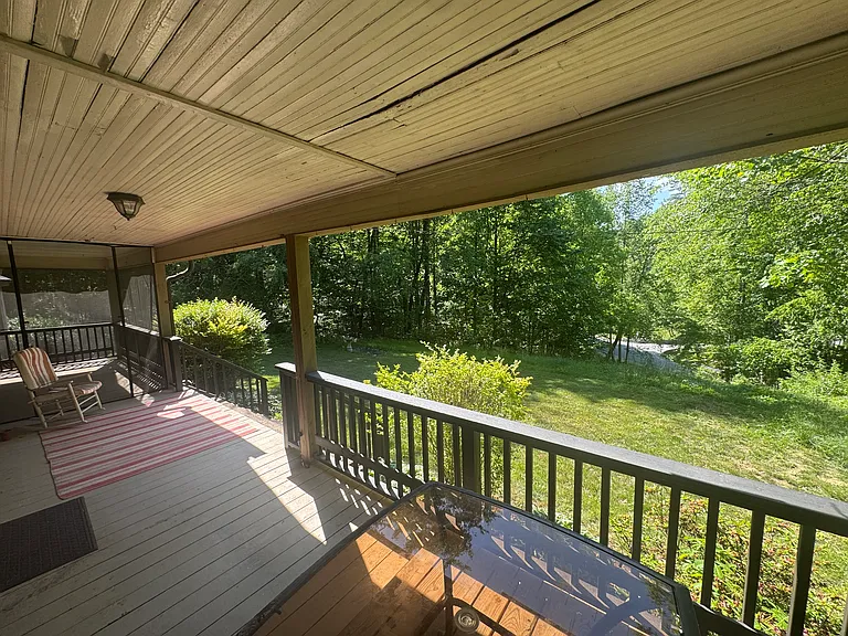 Beautiful mountain views from the front porch. Listen to the Rocky Broad River!