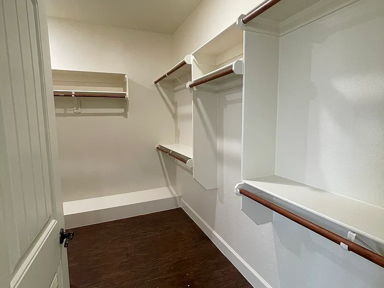 Walk in master bathroom closet