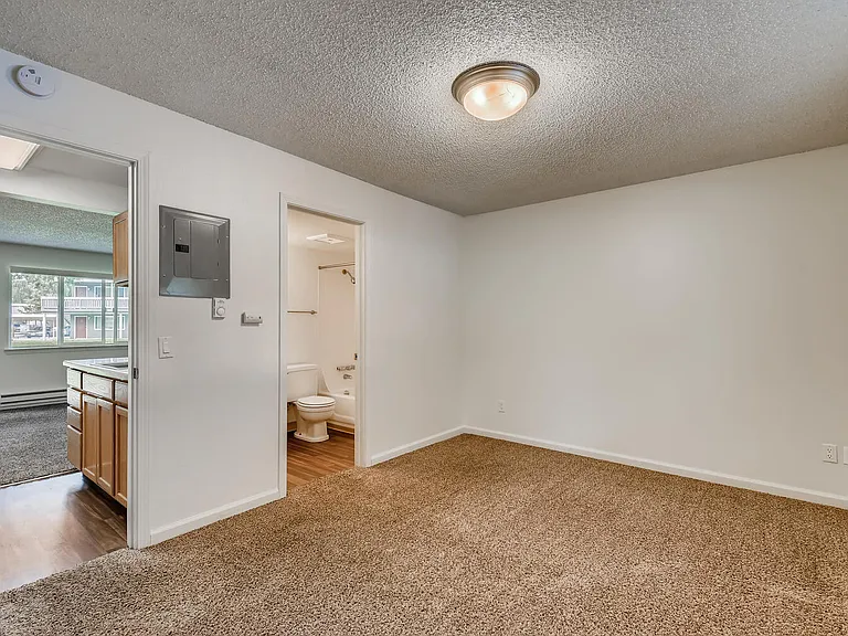 The Bedroom and Bathroom in a One Bedroom Apartment at Morningtree Park Apartments