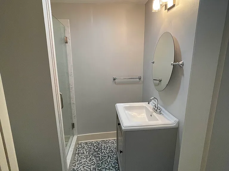 Bathroom with shower. Entrance to this bathroom is through master bedroom.