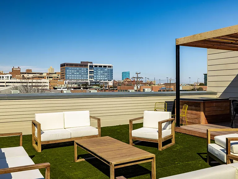 Rooftop terrace has plenty of seating to entertain friends and family!