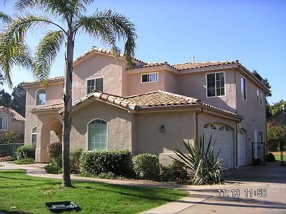 Side of House and garage/yard area