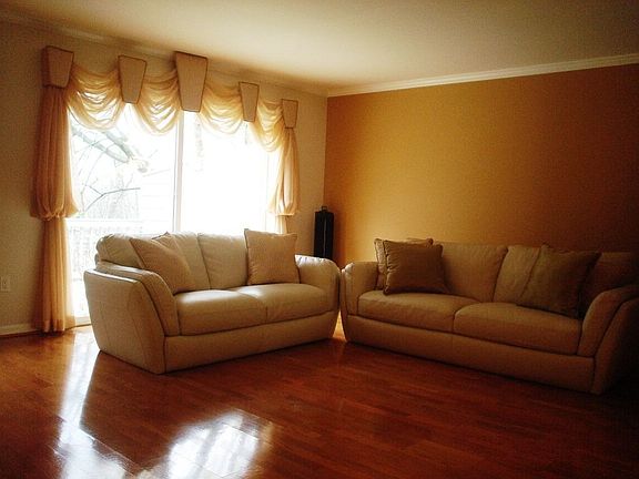 Living room w/ slider to deck