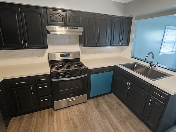 Kitchen with new appliances and contertops