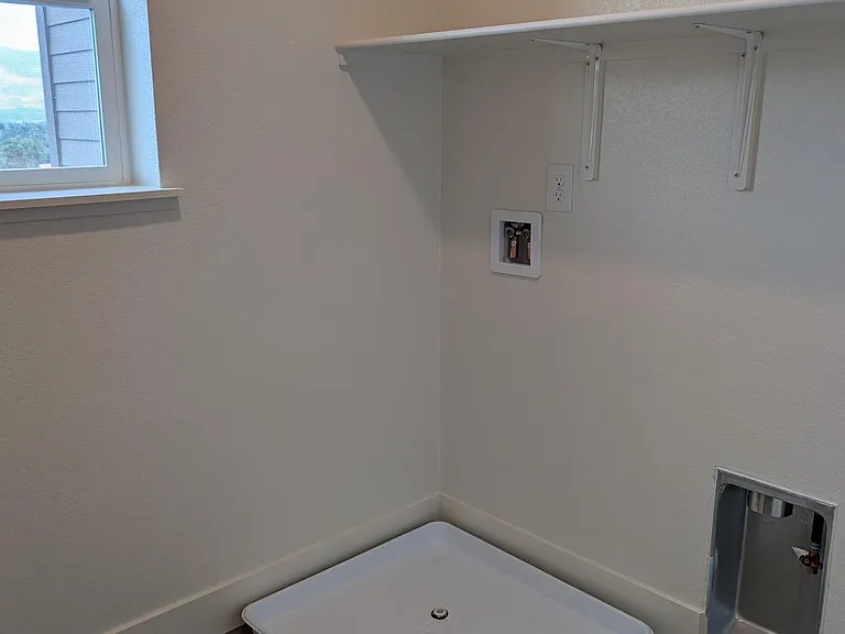 Walk in laundry room upstairs