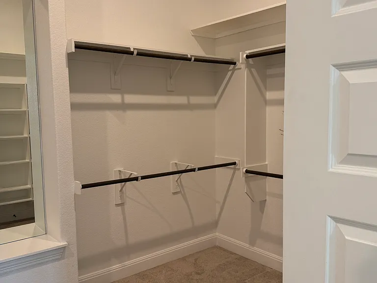 Right side of the main bedroom walk-in closet