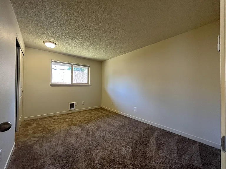 Bright and Airy Home with Stainless Steel Kitchen, Vaulted Ceilings & Washer + Dryer — Photo 37
