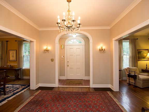 Entryway has Arches & Sconces