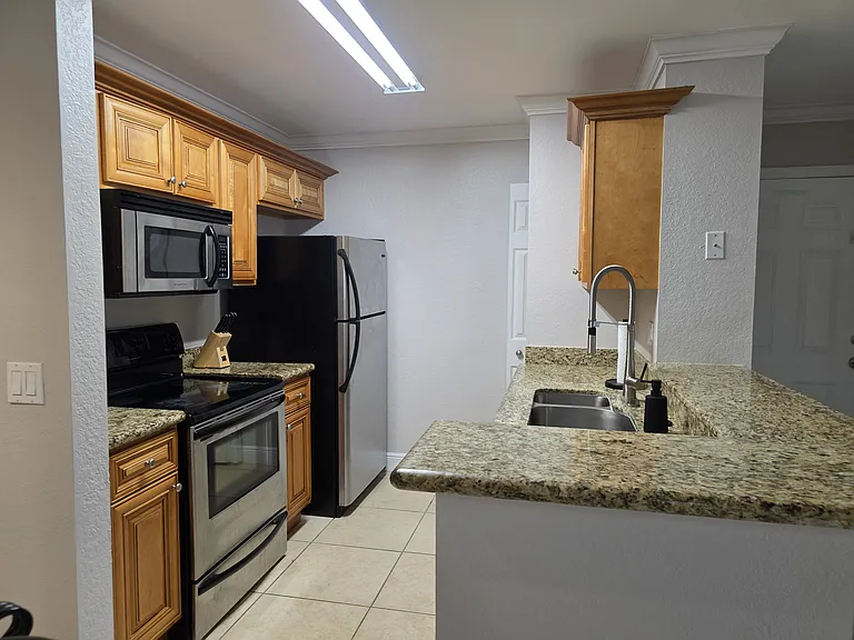 8926 Manor Loop #102 — Photo 56