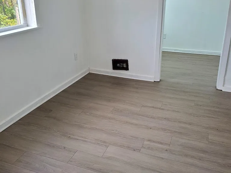 Primary bedroom showing office space or walk-in closet