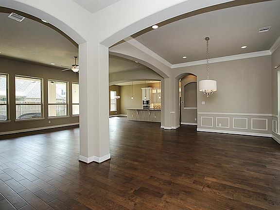 Awesome open concept living/dining kitchen living space with architectural touches throughout.