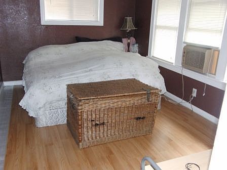 Bedroom with new wood flooring