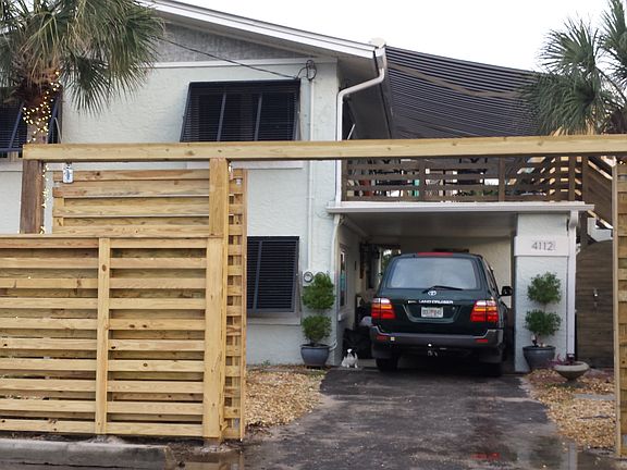 Front of house w/ barn doors