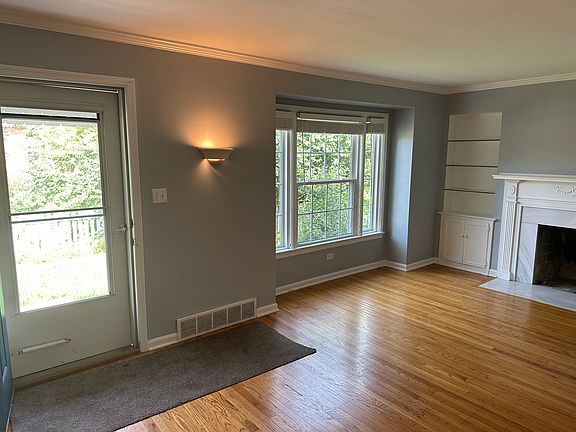 Living room and front entry.