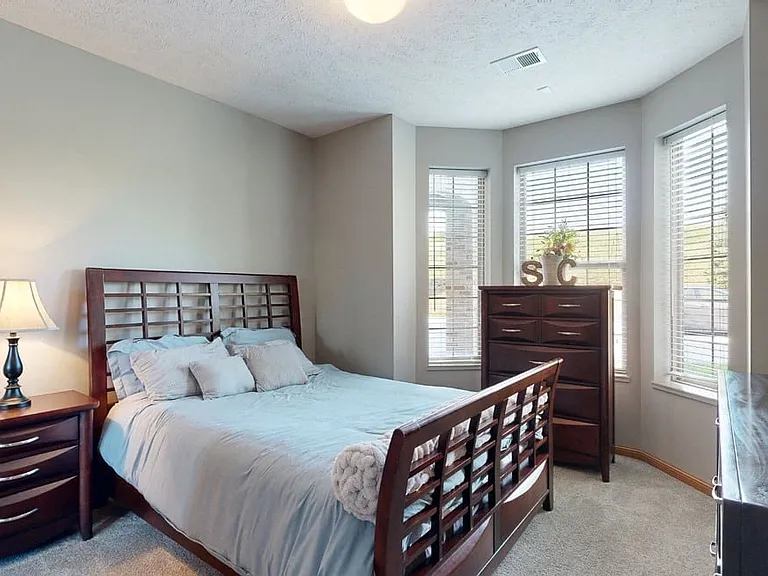 Wake up refreshed in your spacious, sunlit bedroom.