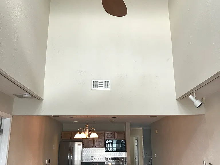 Vaulted ceiling on third floor condo