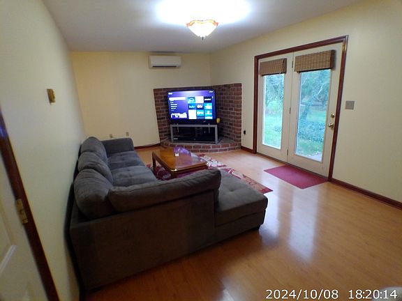 Family Room with furnishings and nonsmart TV