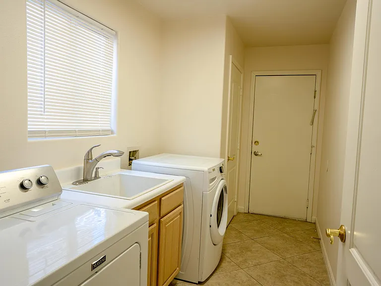 Laundry: washer & drier to garage door