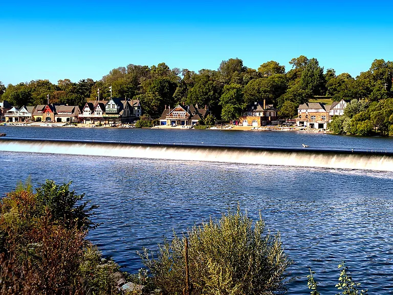 Visit Boathouse Row, a historic site off of the east bank of the Schuylkill River