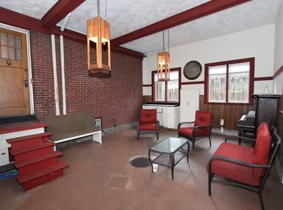 interior of garage entertaining space with entrance to apartment