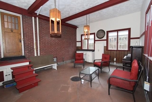 interior of garage entertaining space with entrance to apartment