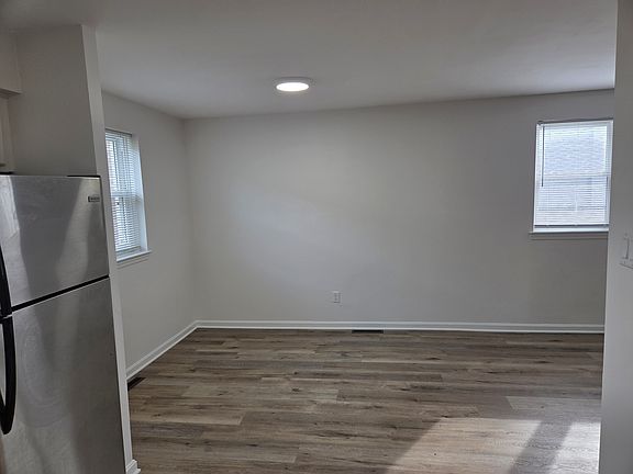 A picture looking from the kitchen out at the dining room portion of the main room.