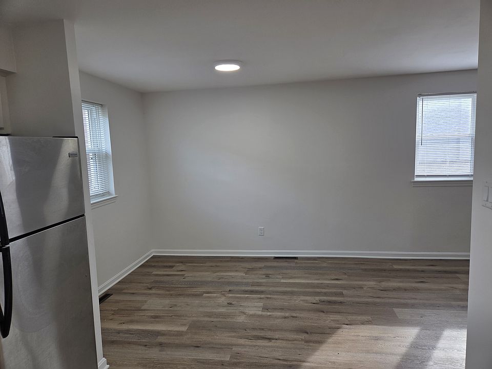 A picture looking from the kitchen out at the dining room portion of the main room.
