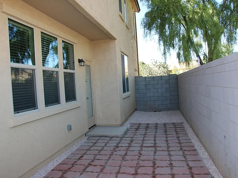 Cozy paved brick side yard