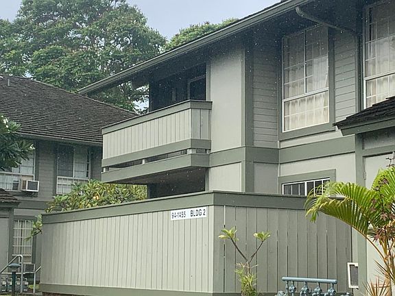 Townhouse unit exterior from parking lot (top left)