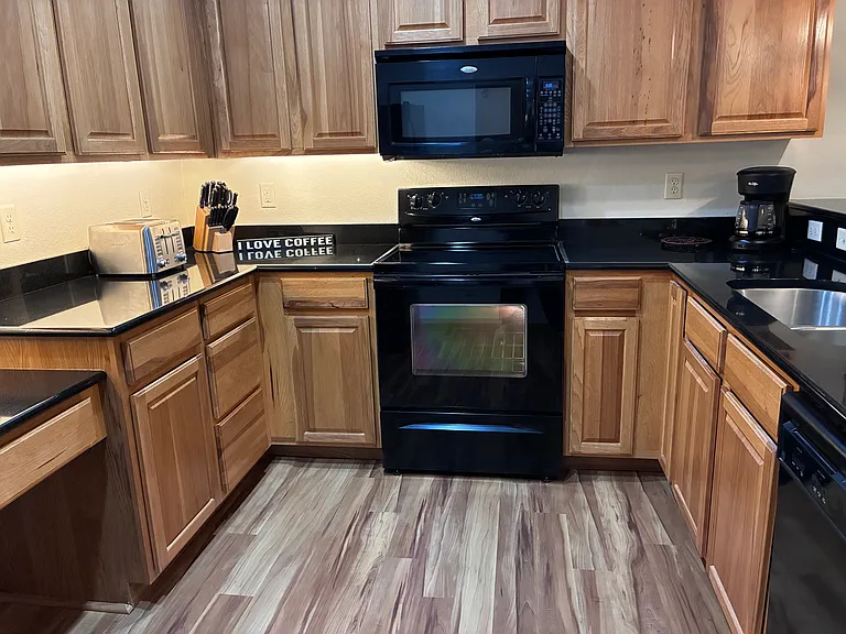 Kitchen that is fully equipped.