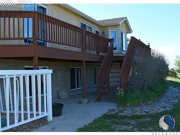 Front showing Deck and Patio