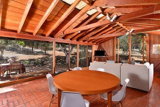 Living room. Gas fireplace is between here and the dining a