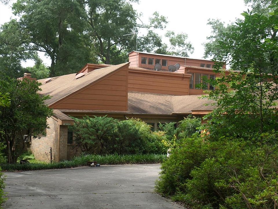 4- Bedroom; 4-Baths; Kitchen; Large family home that sits high up on a hill and has never flooded.