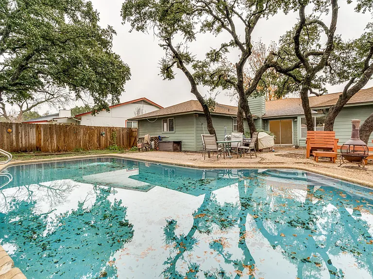 Very Large Fenced Beautiful backyard with Pool & Oak trees!! NO HOA