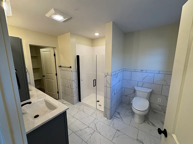 Primary bathroom, electric bidet seat, walk in closet, shower