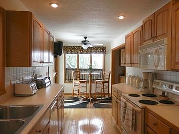 Very neat & clean kitchen overlooking the dining area