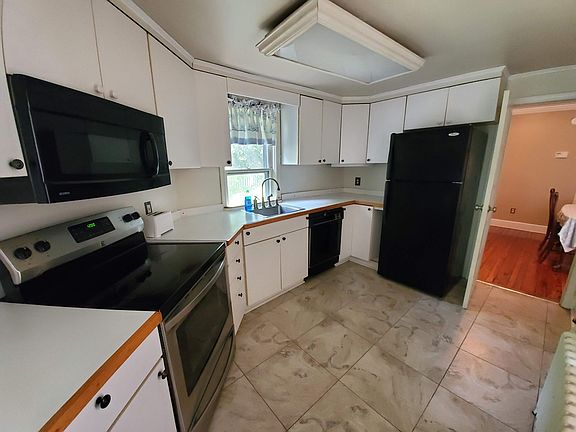 Old kitchen. New kitchen (not pictured) has brand new cabinets, countertop and dishwasher