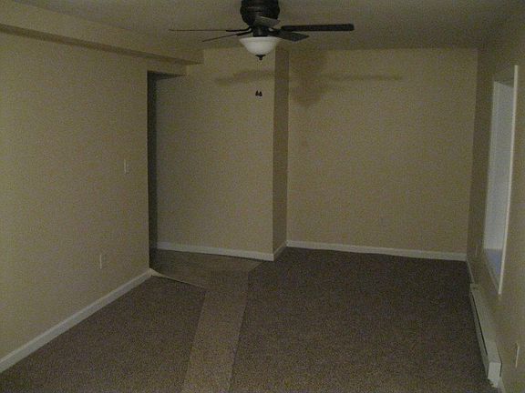living room before carpet scraps picked up
