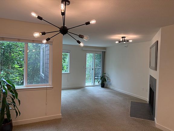 Dining and living areas. Wood burning fireplace.