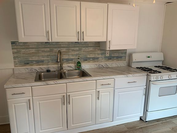 Microwave shelf still needs to be installed over the stove.