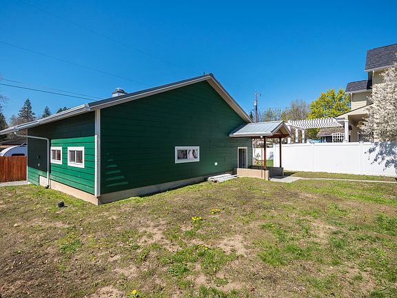 New shop exterior color: white with grey trim.