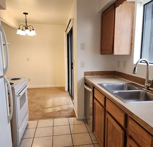 Kitchen facing south Dining room beyond