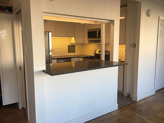 Open kitchen with bar couter